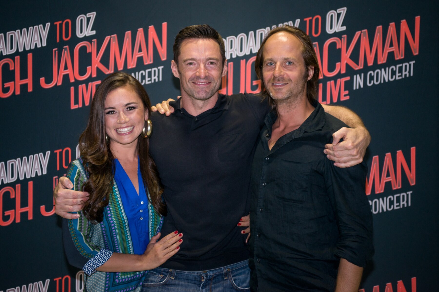 Remco Keijzer with Hugh Jackman and a fellow performer